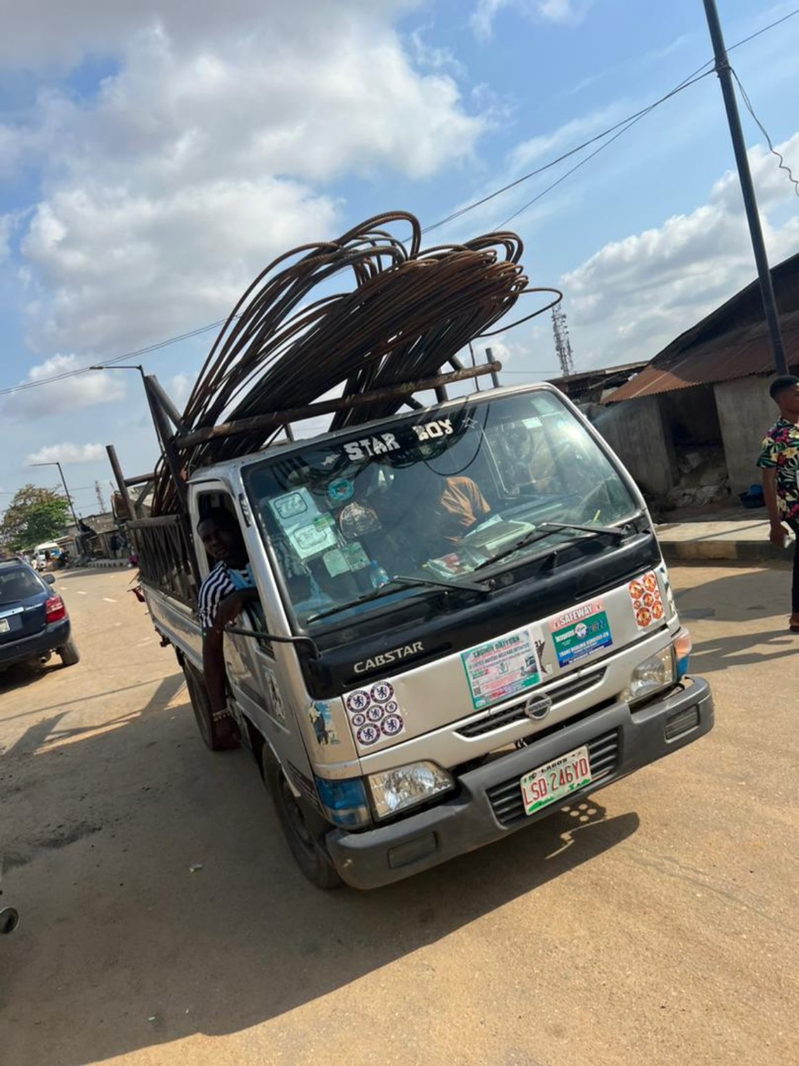 Reinforcement rods loaded for delivery in Lagos